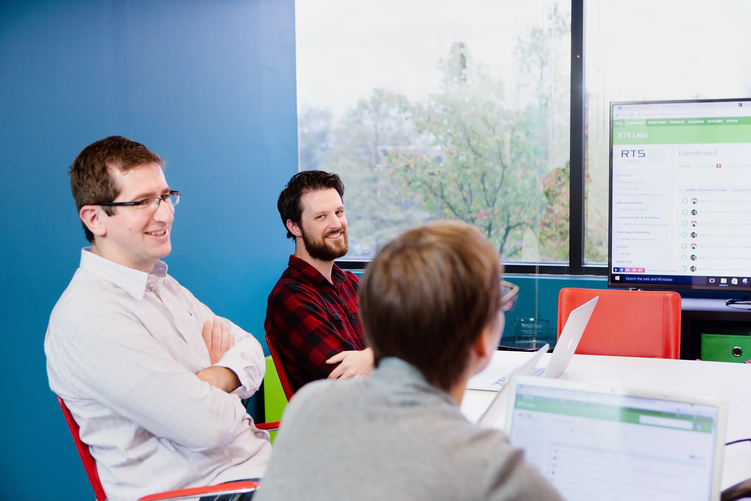 A team looking at the RTS dashboard online