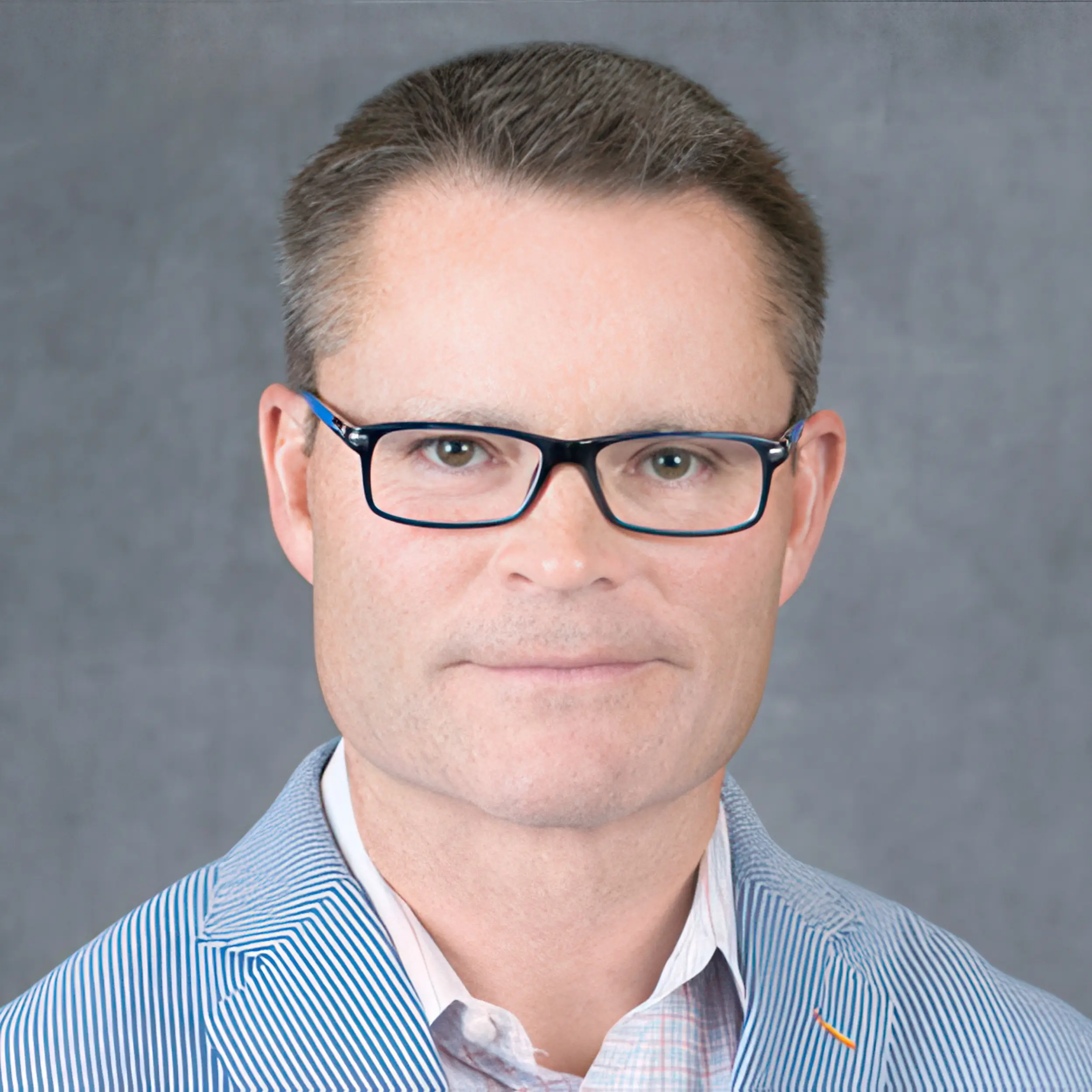 A headshot of Buddy Omohundro