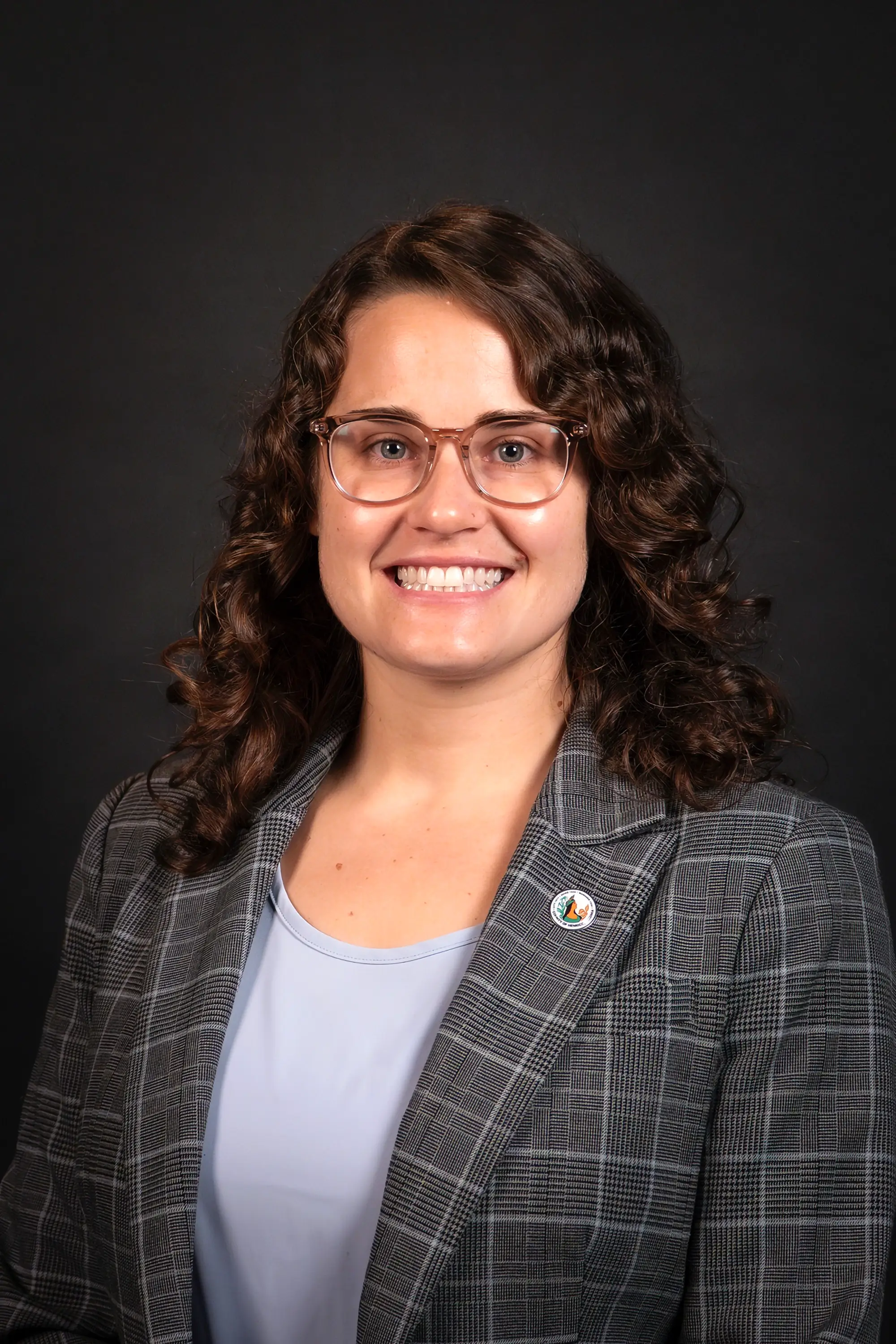 A headshot of Cari Tretina