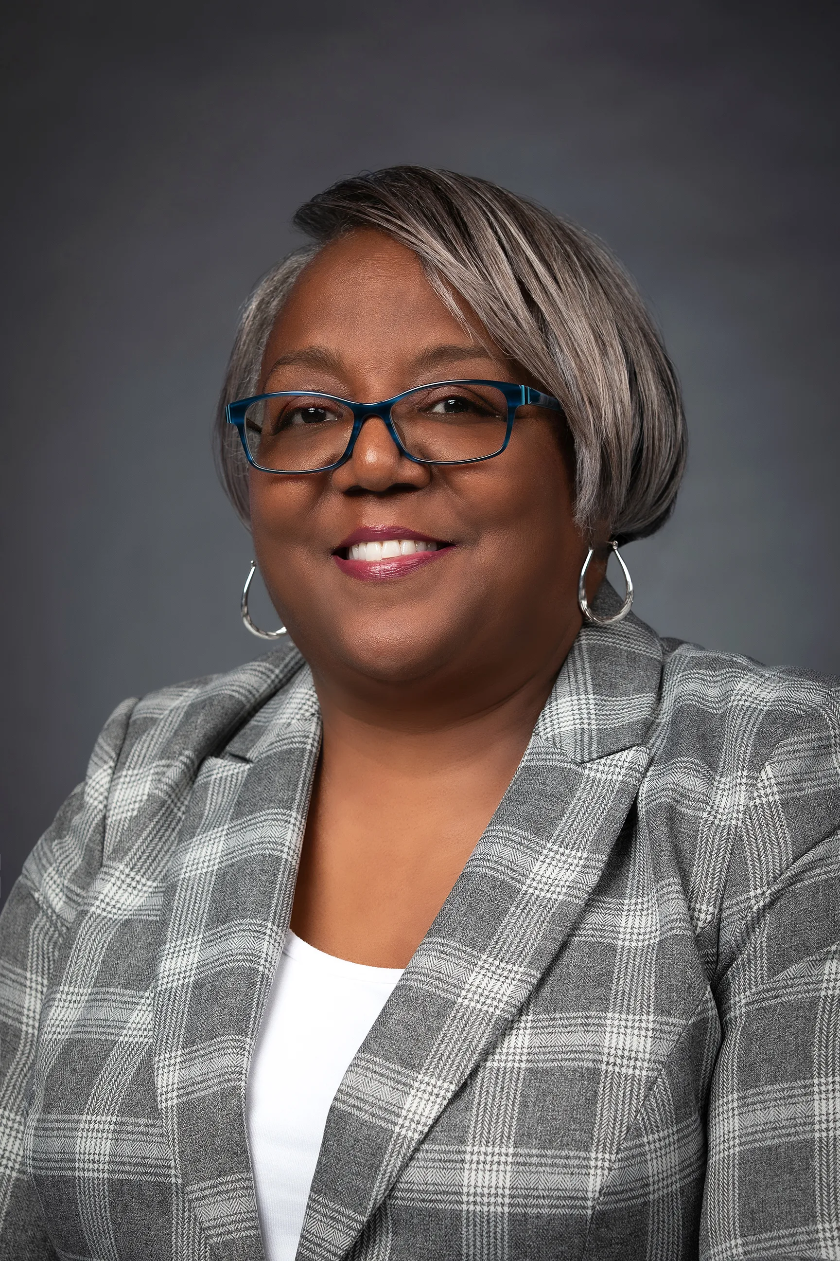 A headshot of Sharon Anderson Grooms