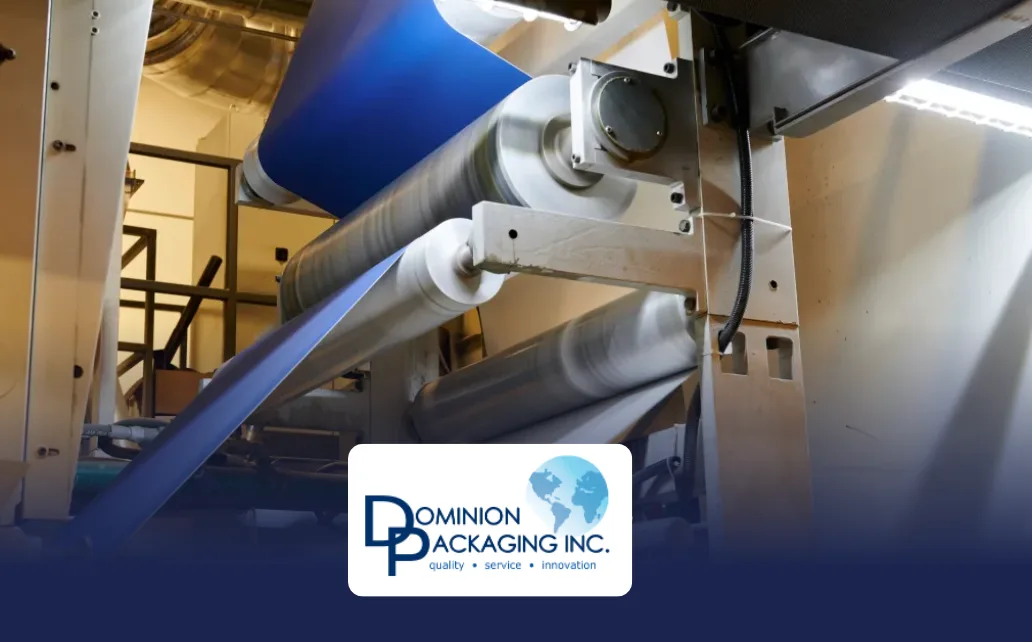 Image of roller machine equipment and Dominion Packaging Inc. logo that includes a blue globe and words "quality", "service", and "innovation"